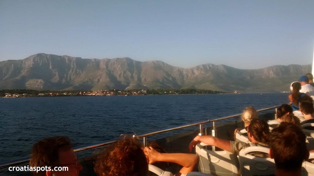Sitting on the outside deck of a fast catamaran ferry boat from Dubrovnik to Split