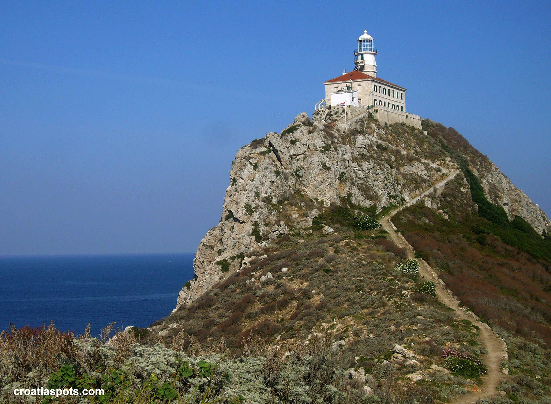 Palagruža Lighthouse on the top of the cliff